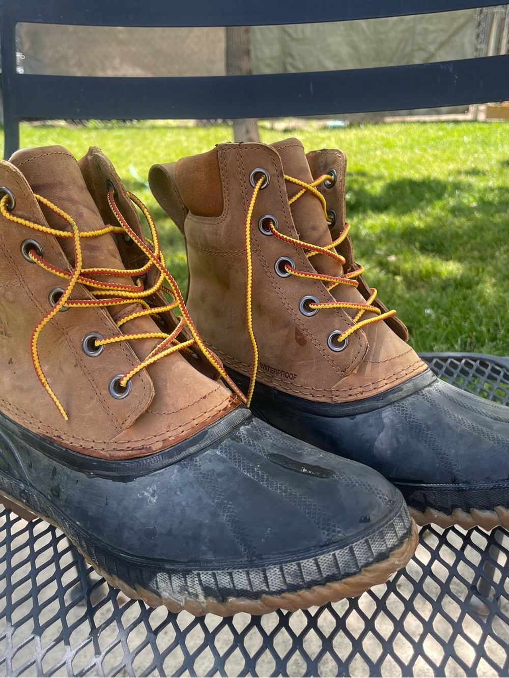 Sorel Brown and Black Waterproof Duck Boots with Yellow Laces